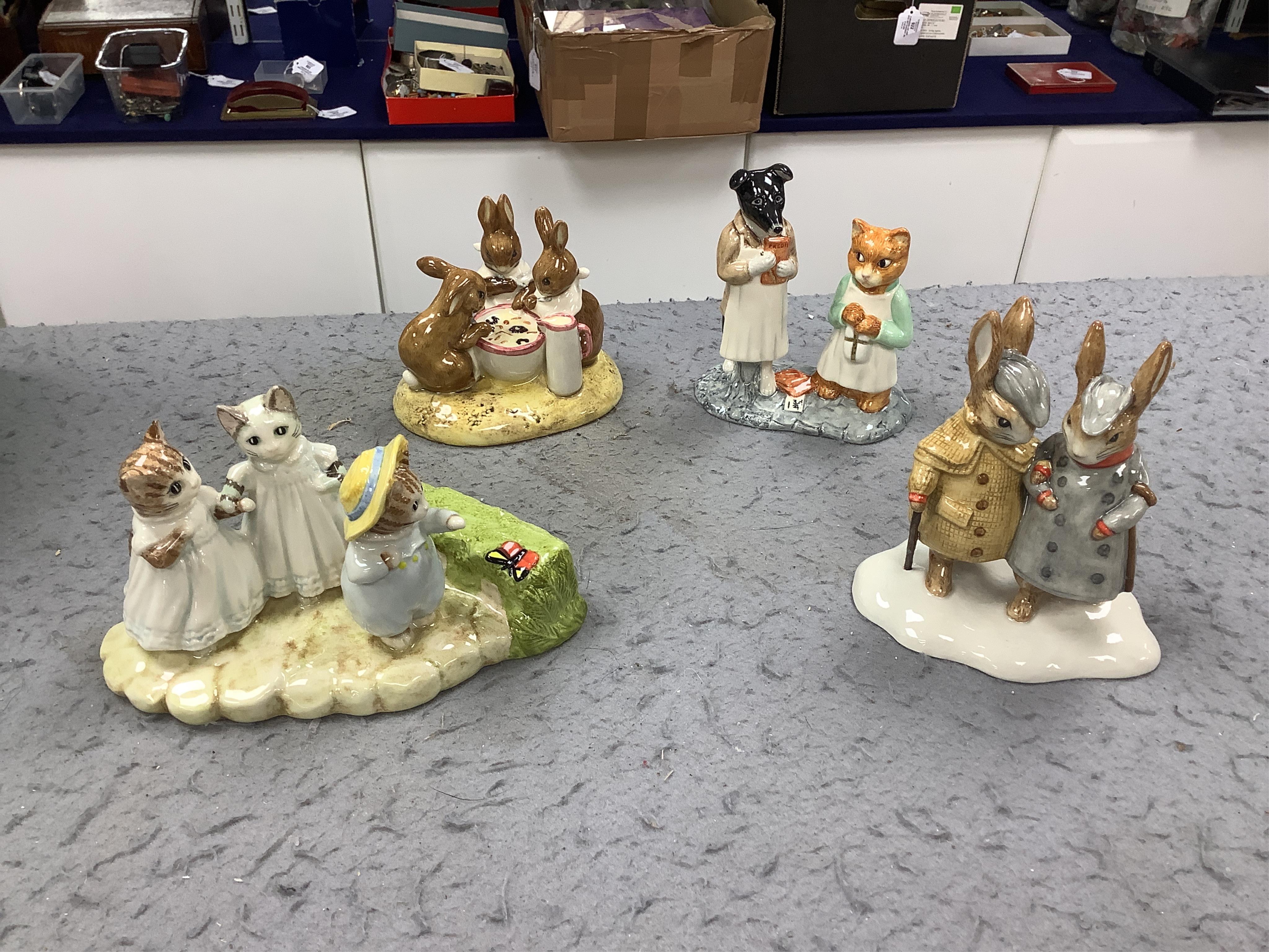 Eight John Beswick figures, mostly Beatrix Potter including Dear Son Thomas, Ginger & Pickles and Two Gentleman, all boxed. Condition - good